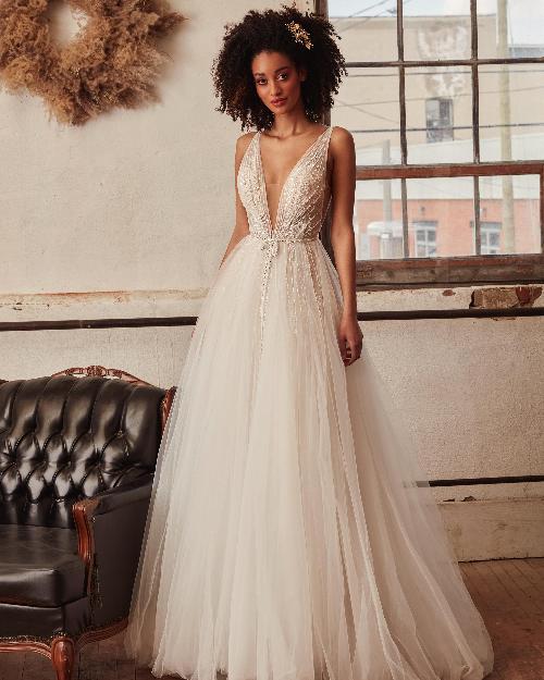La21220 sparkly tulle wedding dress with straps and a line silhouette1